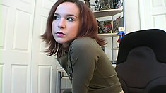 Skinny brunette teen teases with her tight little ass on a webcam