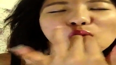 Freaky Asian girl pleasuring herself - selfie